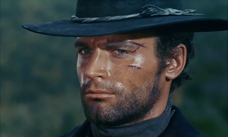 Terence Hill, https://commons.wikimedia.org/wiki/File:Preparati_la_bara!_Terence_Hill.png, frame da Italian film Preparati la bara! by Ferdinando Baldi (1968), Pubblico Dominio