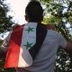 Siria https://pixabay.com/it/photos/umano-mossa-bandiera-siria-guerra-3610097/